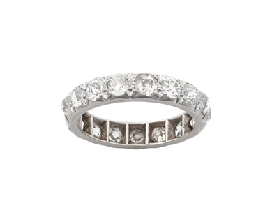 Lot 2217 - A Diamond Eternity Ring the seventeen old cut...