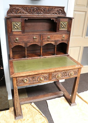 Lot 1378 - A Carved Oak and Leather-Inset Desk, circa...