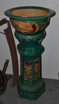 Lot 890 - Green glazed urn with pedestal