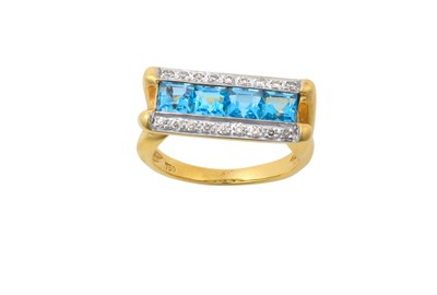 Lot 2047 - A Blue Topaz and Diamond Ring four calibré cut...