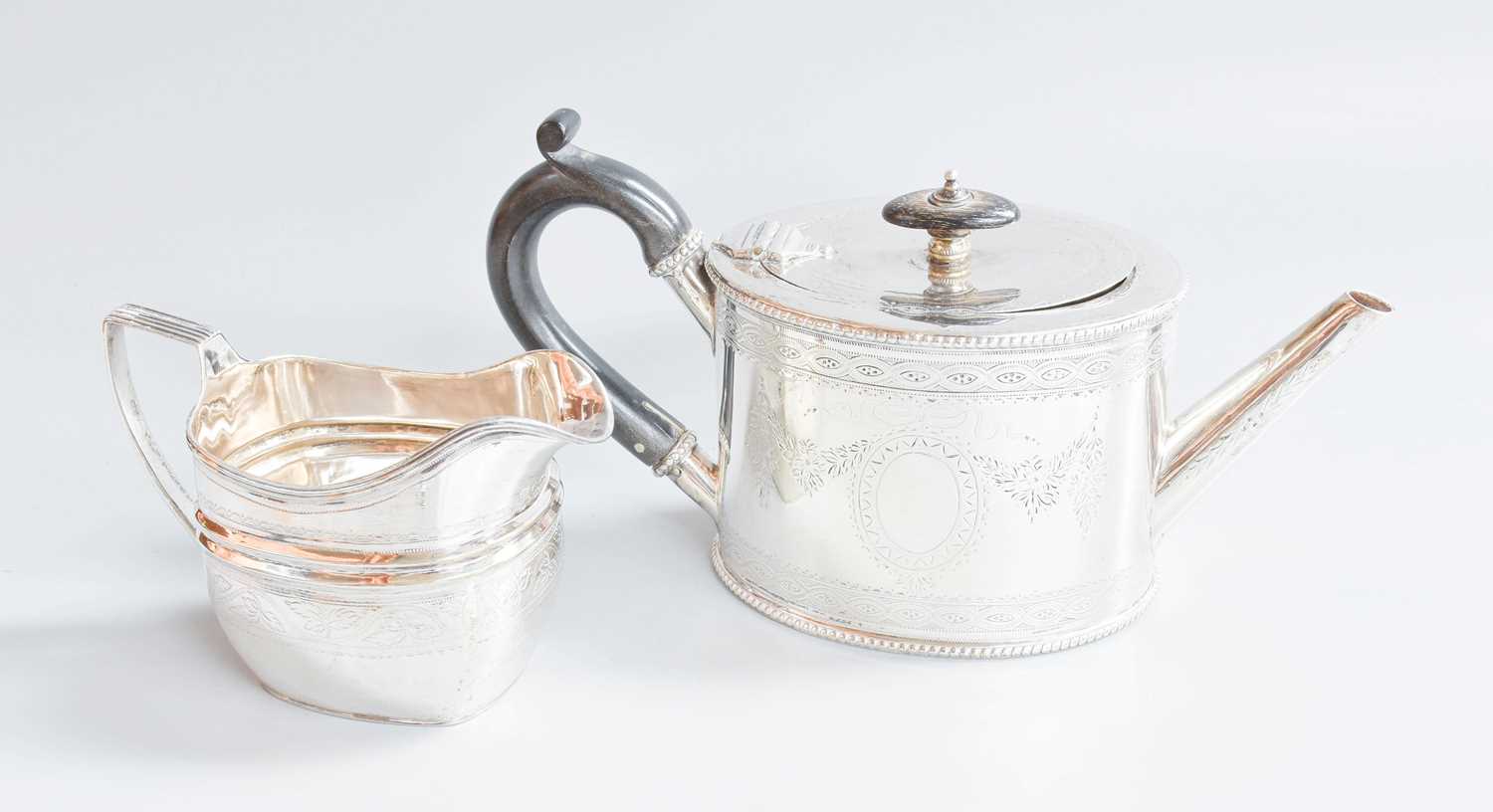 Lot 19 - A Victorian Silver Teapot, by William Wrangham...