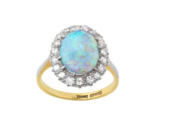 Lot 2182 - An Opal and Diamond Cluster Ring the oval...