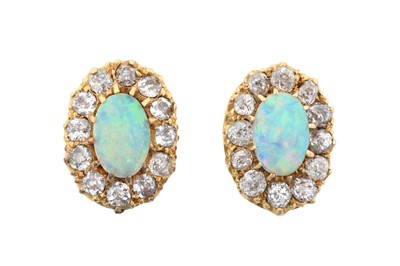 Lot 2183 - A Pair of Opal and Diamond Cluster Earrings...