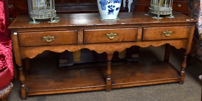 Lot 1490 - An 18th Century Style Oak Low Dresser, the...