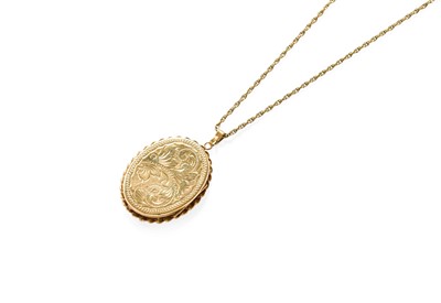 Lot 316 - A 9 Carat Gold Locket on Chain, the oval...