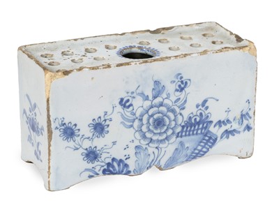 Lot 305 - An English Delft Flower Brick, circa 1750, on...