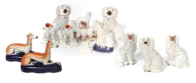 Lot 36 - A Staffordshire Pottery Group of Three Poodles,...