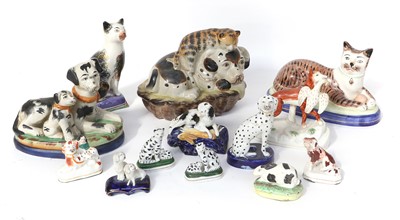 Lot 166 - A Staffordshire Pottery Model of a Cat, late...