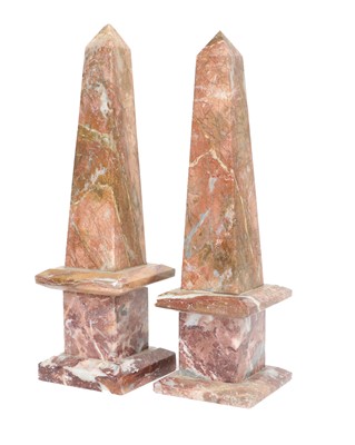 Lot 220 - A Near Pair of Variegated Pink Marble Obelisks,...