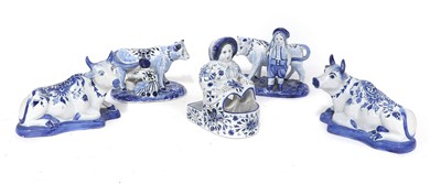 Lot 183 - A Pair of Delft Milking Groups, 20th century,...