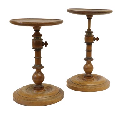 Lot 310 - A Near Pair of Turned Walnut Adjustable Candle...