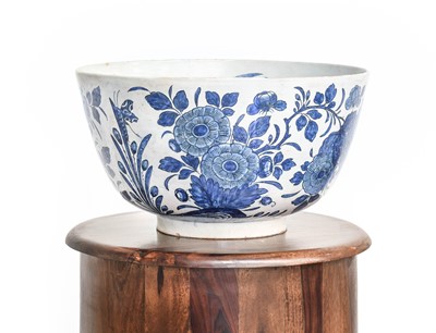 Lot 257 - A Delft Punch Bowl, 18th century, painted in...