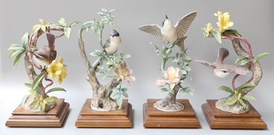 Lot 138 - Four Royal Worcester Bisque Bird Models, a...