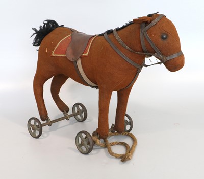 Lot 2002 - Early 20th Century Steiff Pull Along Horse on...