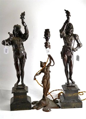 Lot 28 - Pair of decorative figures and an Art Nouveau style figural lamp (3)