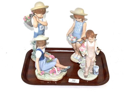 Lot 32 - Four Lladro figures; 'Spring' 5.217, 'My Flowers' 1284, 'Flower Harvest' 1.286 and 'Picking...