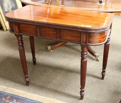 Lot 1353 - A Regency Mahogany Fold Over Tea Table, with...