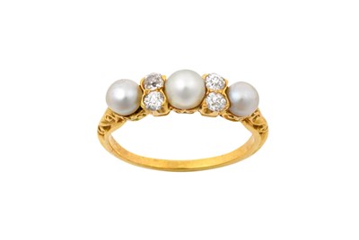 Lot 2193 - A Pearl and Diamond Ring the graduated pearls...