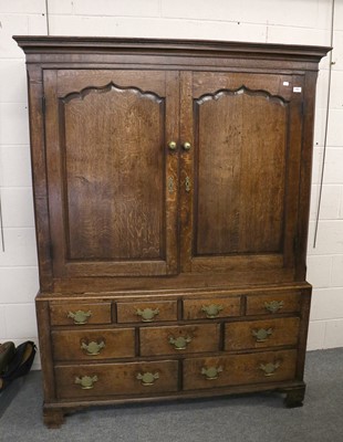 Lot 1461 - A Late Georgian Oak Linen Press, moulded...