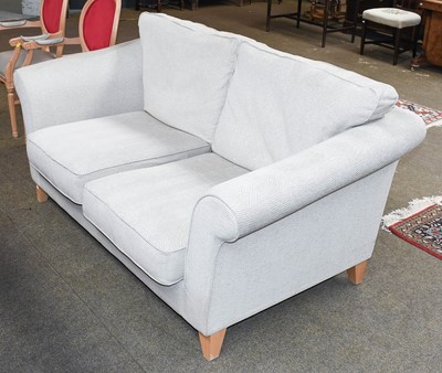 Lot 1215 - A Two Seater Sofa, with striped fabric...