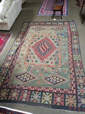 Lot 1284 - Large Turkish Kilim, the apple green field...