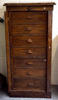 Lot 1451 - A 20th Century Oak Wellington Chest, with...