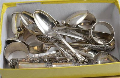 Lot 54 - Assorted silver including teaspoons, napkin rings, egg cups, pair of plated knife rests etc