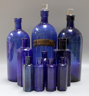 Lot 214 - A Quantity of Blue Glass Apothocary Bottles,...