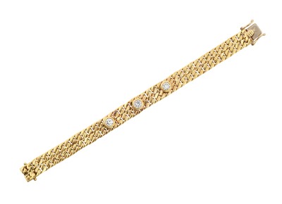 Lot 2221 - A Diamond Bracelet a yellow double row flat...