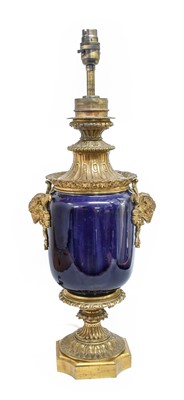 Lot 199 - A French Gilt-Metal-Mounted Blue-Glazed Lamp...