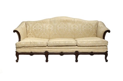 Lot 726 - A Carved Mahogany Camel-Back Three-Seater Sofa,...