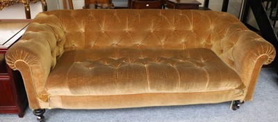 Lot 1452 - A Victorian Chesterfield Sofa, with mustard...