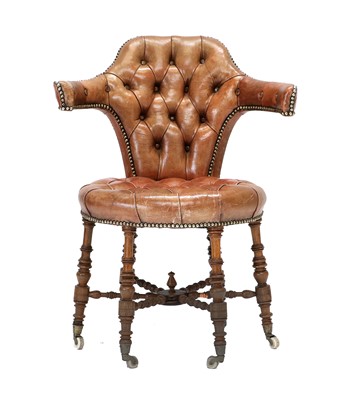 Lot 357 - A Mid 19th Century Reading Chair, covered in...