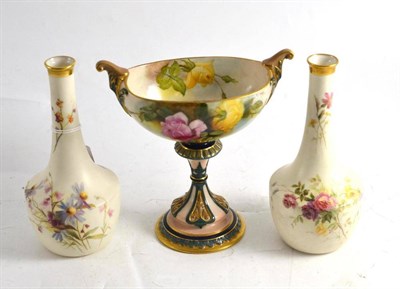 Lot 75 - Royal Worcester pedestal vase and a pair of bottle shaped vases