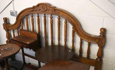 Lot 1449 - A Modern Walnut Kingsize Bedstead, with carved...