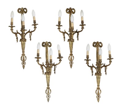 Lot 223 - A Set of Four French Ormolu Three-Light Wall...