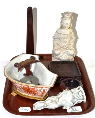 Lot 81 - Chinese porcelain dish on gilt metal base, two white Guanyin, four wood stands and a jade bi disc