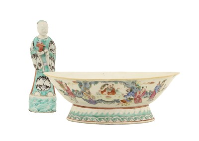 Lot 144 - A Chinese Porcelain Figure of a Deity, early...