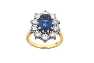 Lot 2236 - An 18 Carat Gold Sapphire and Diamond Cluster...