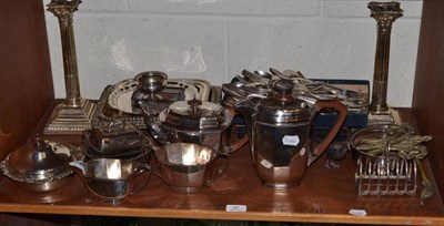 Lot 97 - Quantity of silver plated items including American cutlery, four piece tea set, candlesticks,...