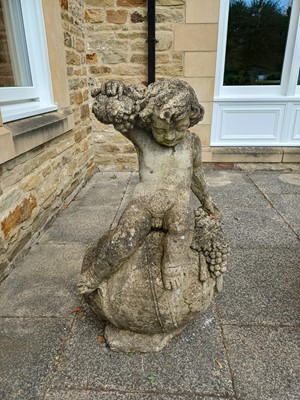 Lot 1193 - A Weathered Composition Garden Statue of a...