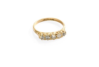 Lot 563 - An 18 Carat Gold Diamond Five Stone Ring, the...