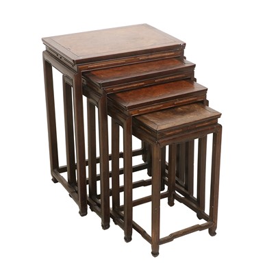 Lot 439 - A Nest of Four Chinese Hongmu and Huamu Tables,...