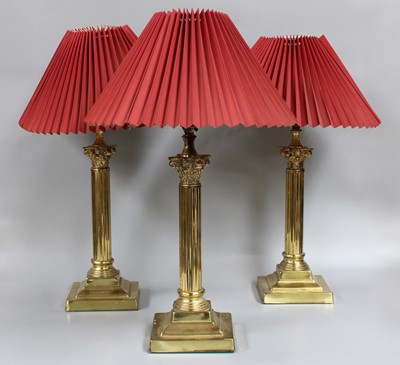 Lot 1412 - A Set of Three Brass Corinthian Column Form...