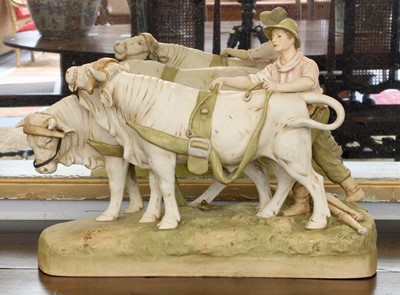 Lot 458 - A Royal Dux Model of a Young Farmhand...