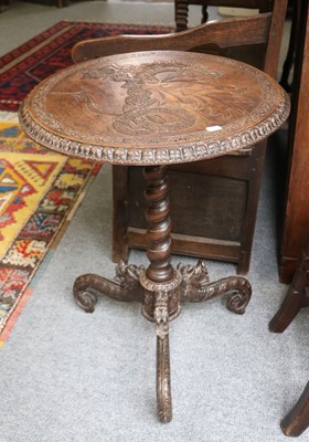 Lot 1377 - A 19th Century Carved Oak Tripod Table, the...