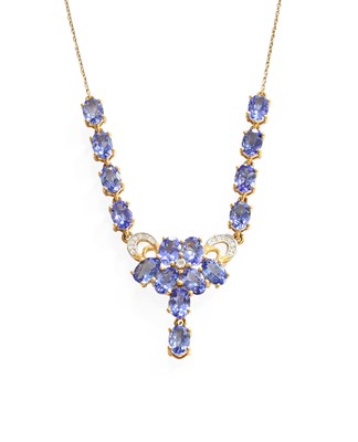 Lot 506 - A 9 Carat Gold Tanzanite and Diamond Necklace,...