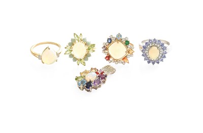 Lot 481 - Three 9 Carat Gold Opal Rings, of varying...