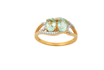 Lot 2050 - An 18 Carat Gold Paraíba Tourmaline Ring two...