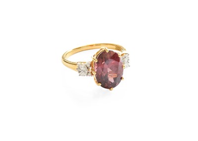 Lot 527 - An 18 Carat Gold Zircon and Diamond Ring, the...